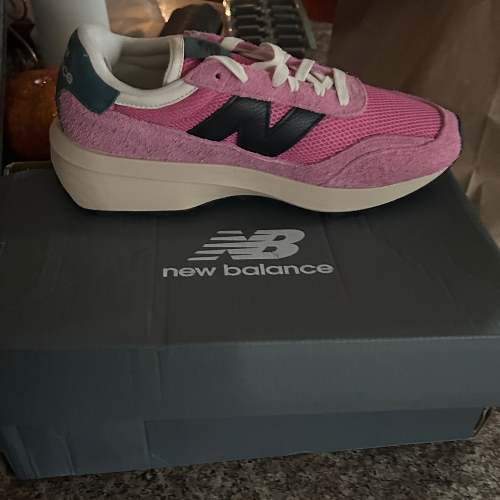 New Balance Pink and Black Running Shoes